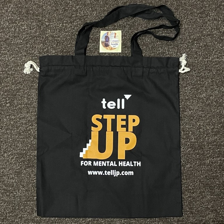 2022 TELL Step Up Challenge swag: tote bag and sticker